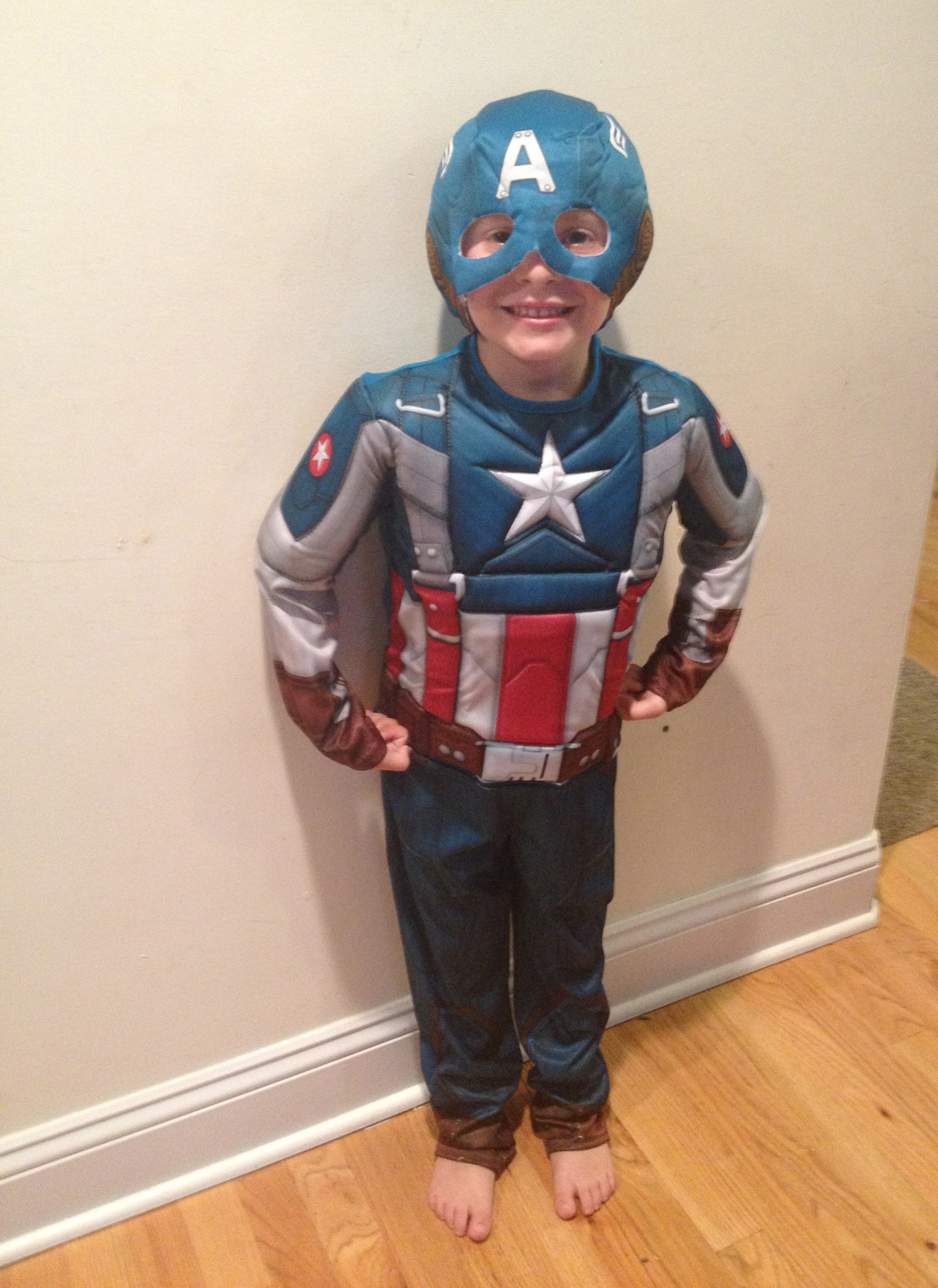 Tyler was so excited to put on his awesome Captain America Costume! It fit perfectly!
