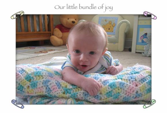 An easy way to set up tummy time is roll up a blanket and prop your baby up! It also makes for great pictures!